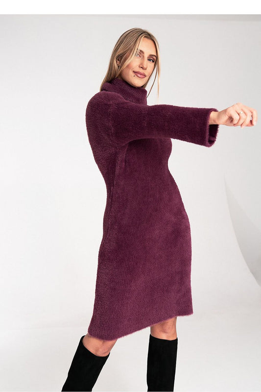 Woman wearing a purple dress on a white background