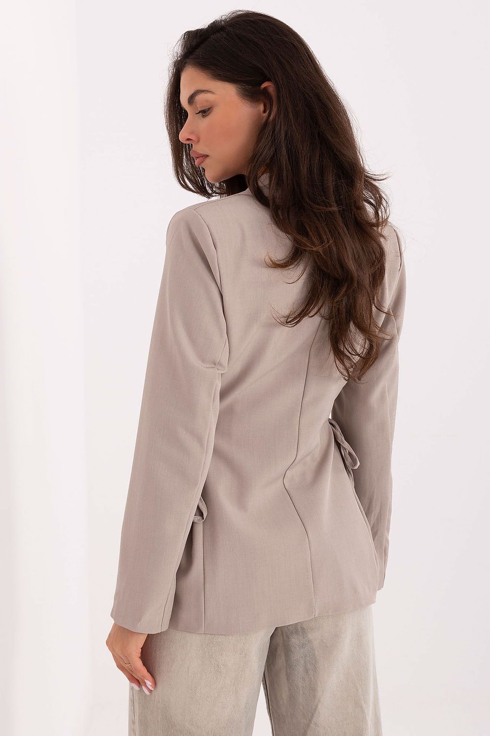 Back view of tailored women’s blazer with smooth finish and structured fit