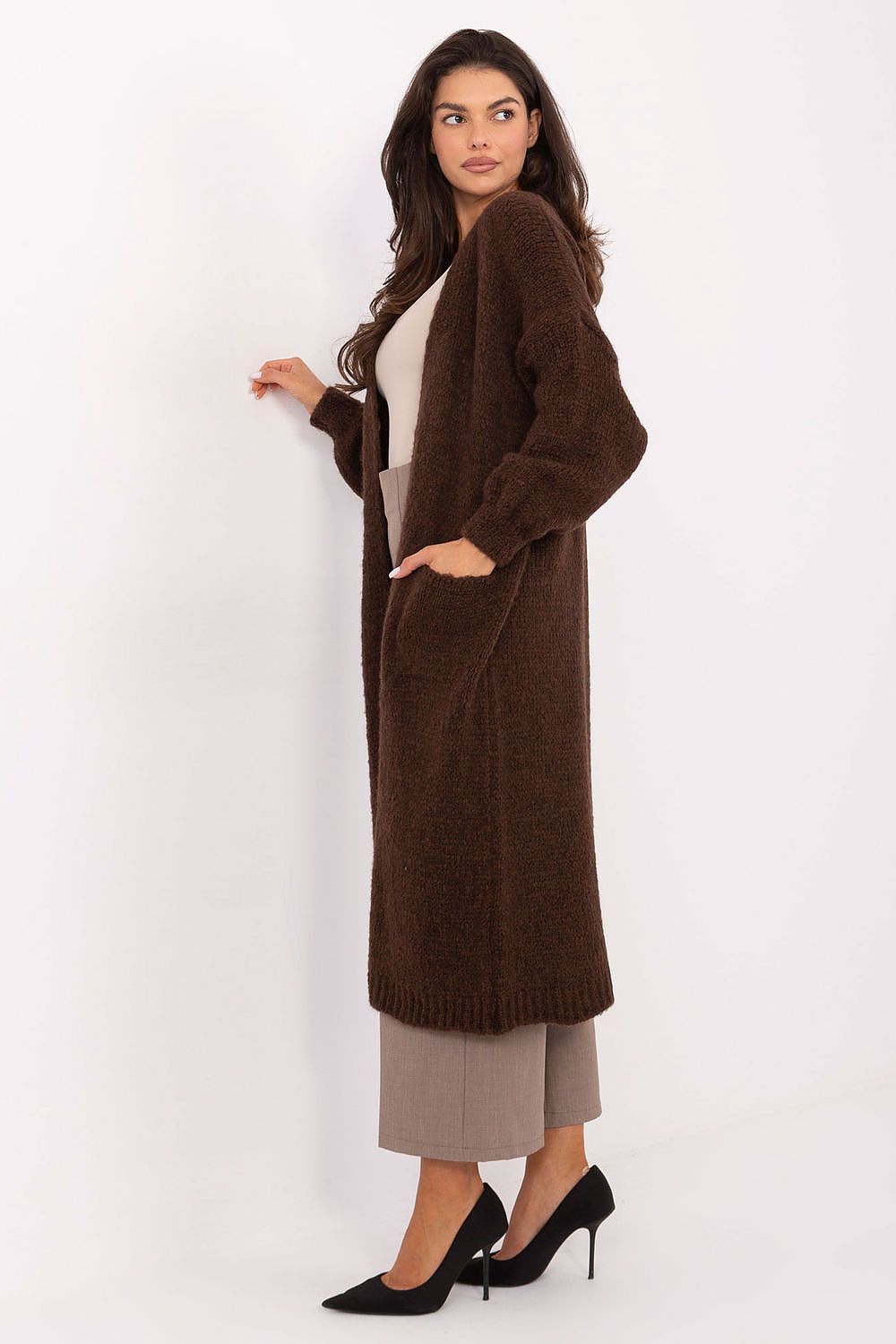 Side view highlighting soft texture and comfortable fit of Liora knee-length cardigan.