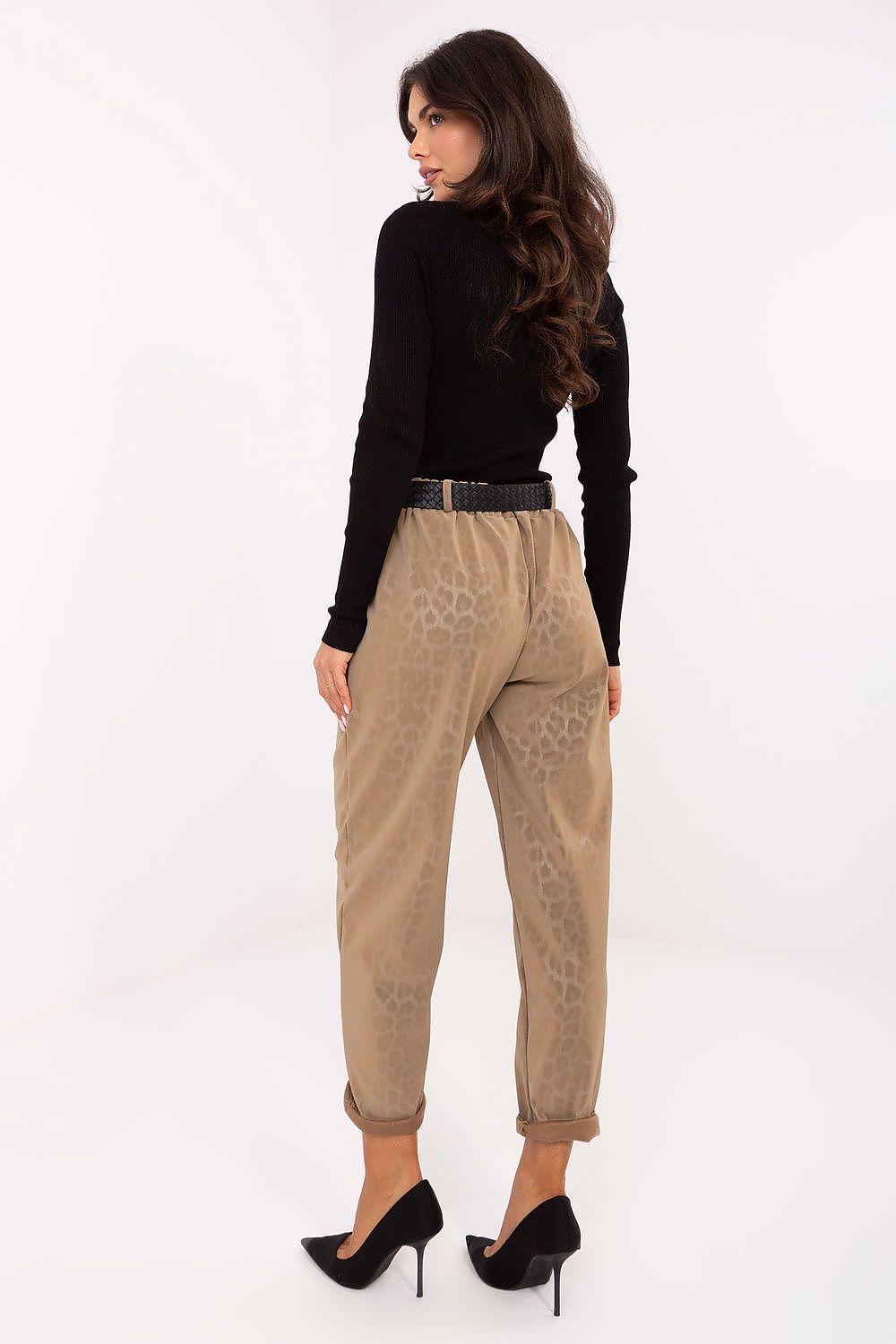 Stylish high-waisted eco leather pants – side view showing tapered legs and pockets