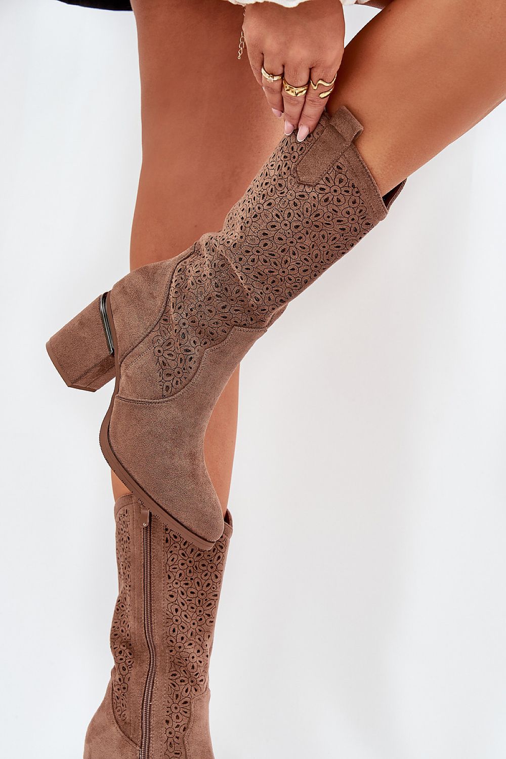 Side view highlighting reinforced heel and elegant silhouette of brown S.Barski boots.