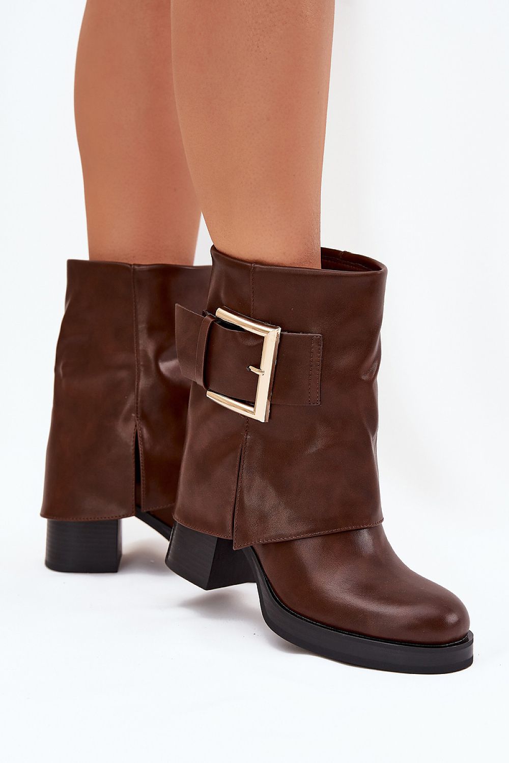 Side view showing warm lining, slip-on cut, and sophisticated buckle of brown Liora boots.