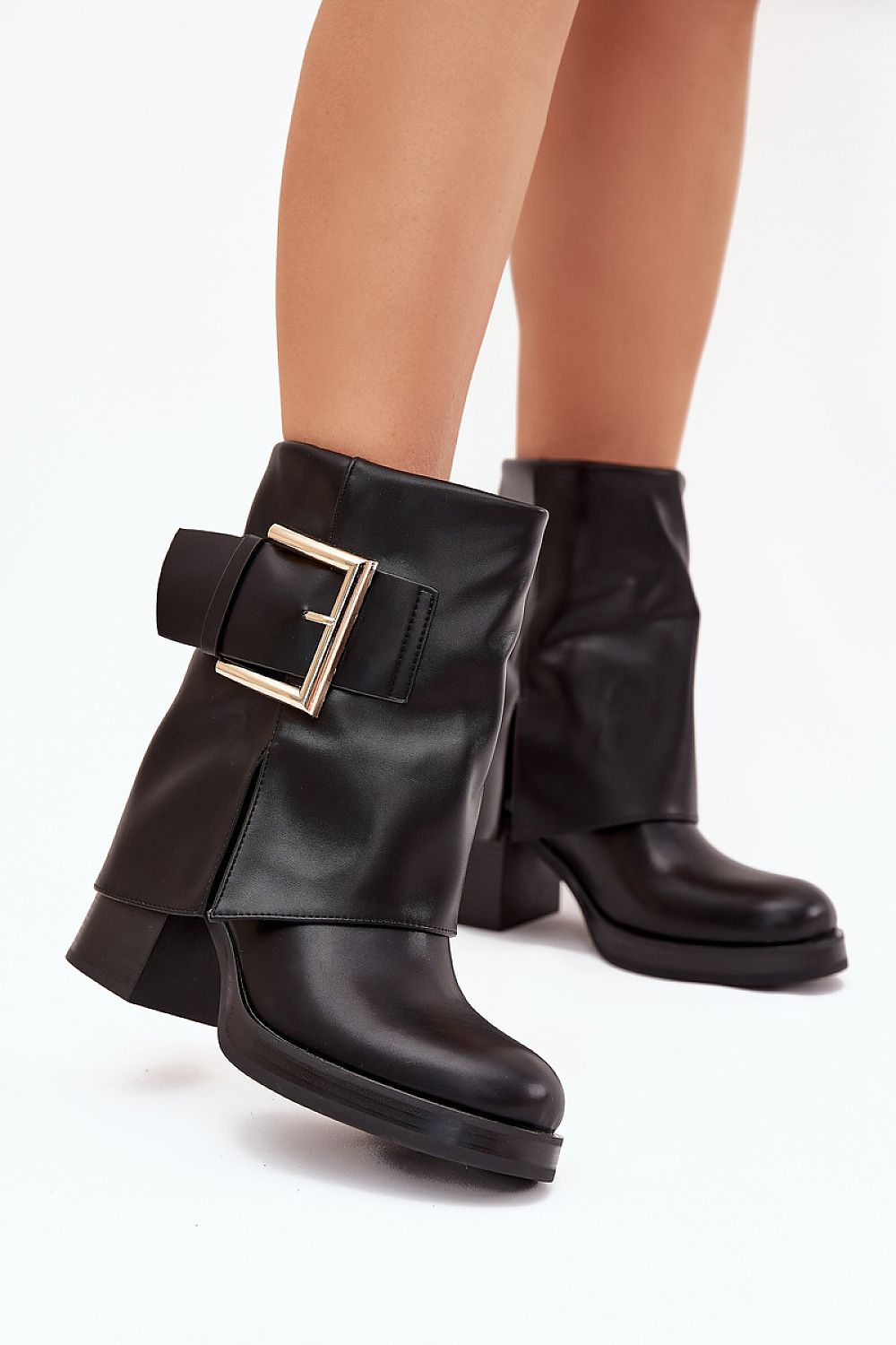 Front view of Liora Women’s black eco leather ankle boots with column heel and gold buckle.
