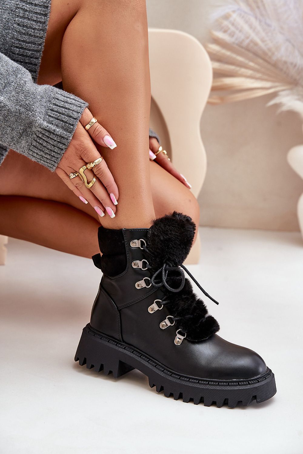 Side view 2 of black eco leather ankle boots with zipper and laces