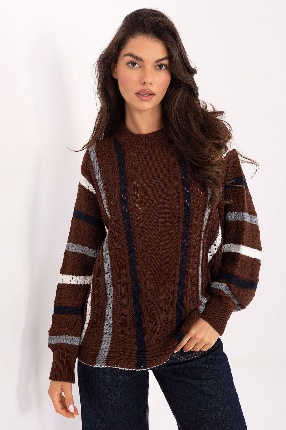  Brown oversized women’s sweater with openwork stripes, front view.