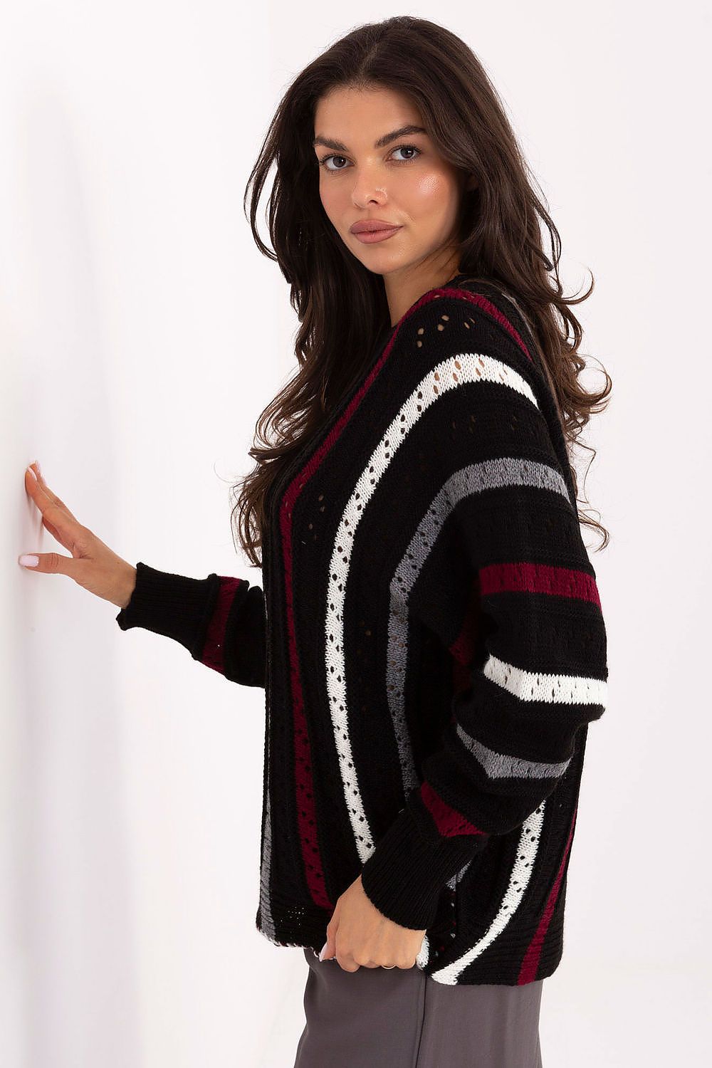  Soft black knit sweater, long sleeves, casual everyday design.