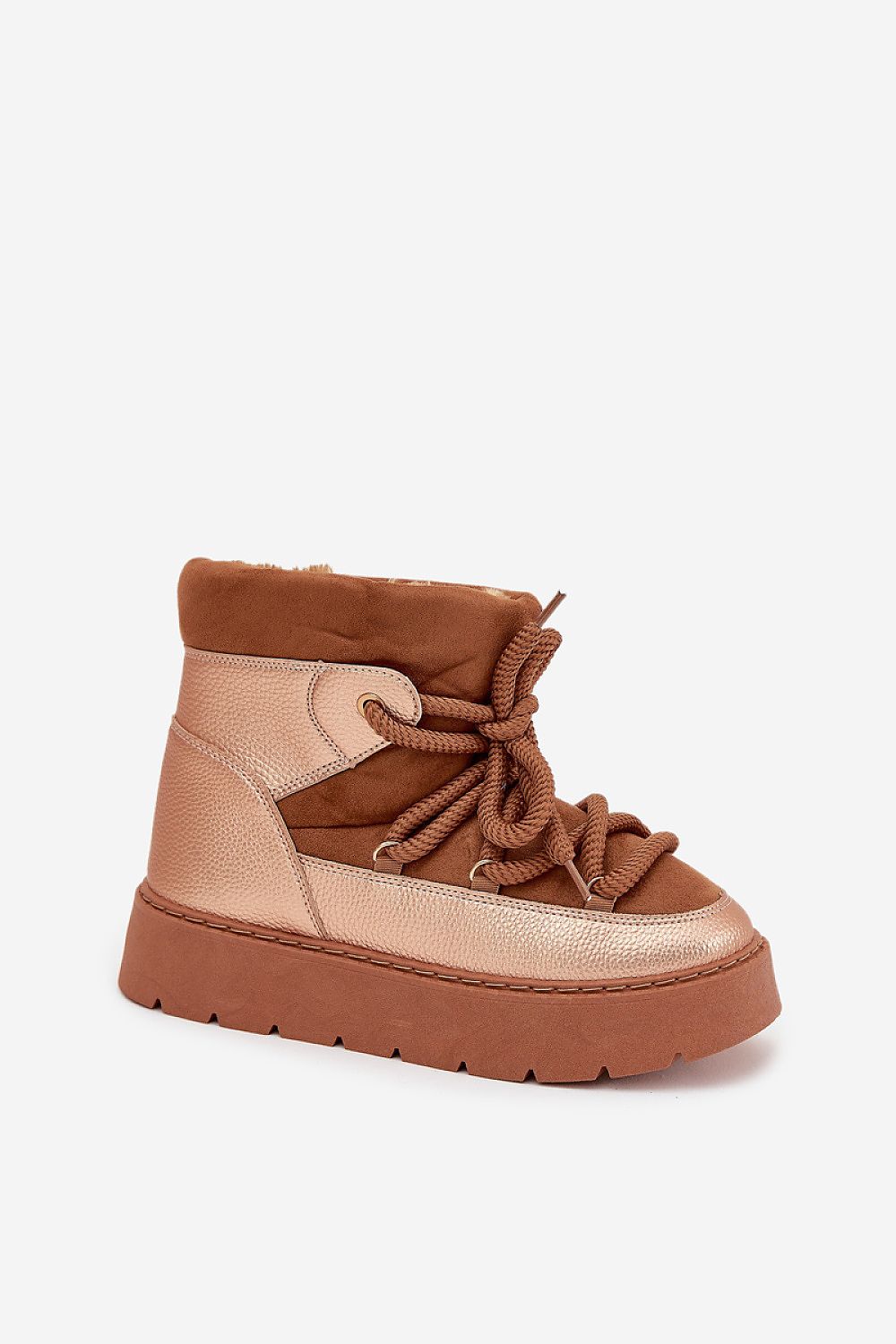 Standalone image of brown women’s low snow boots with plush fur interior