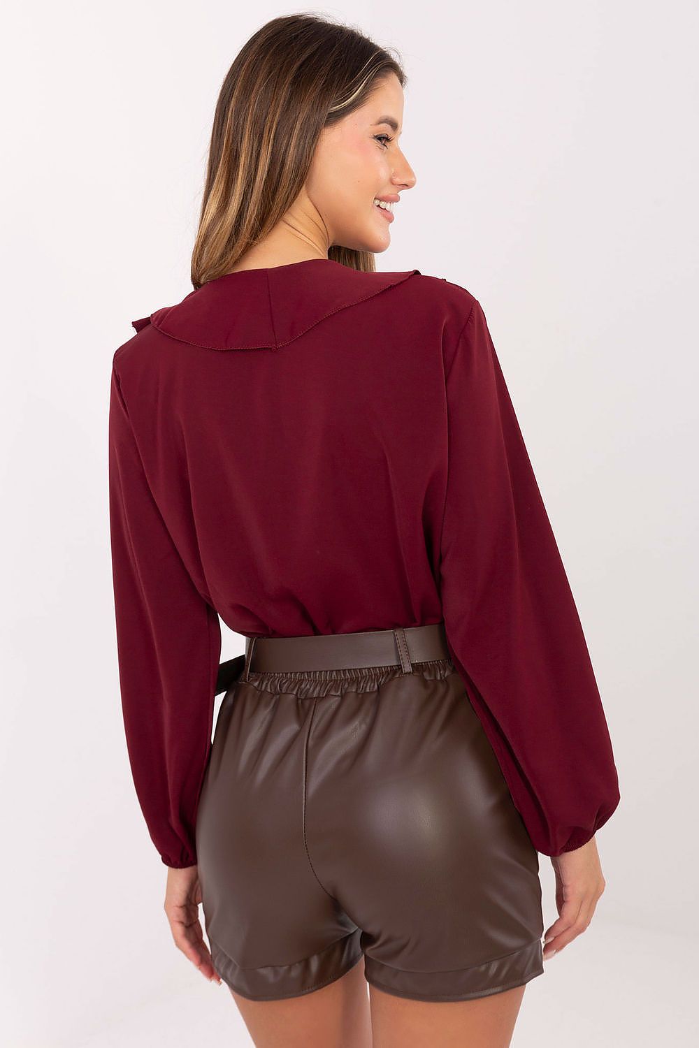 Standalone image – Brown belted eco leather shorts displayed on a white background.