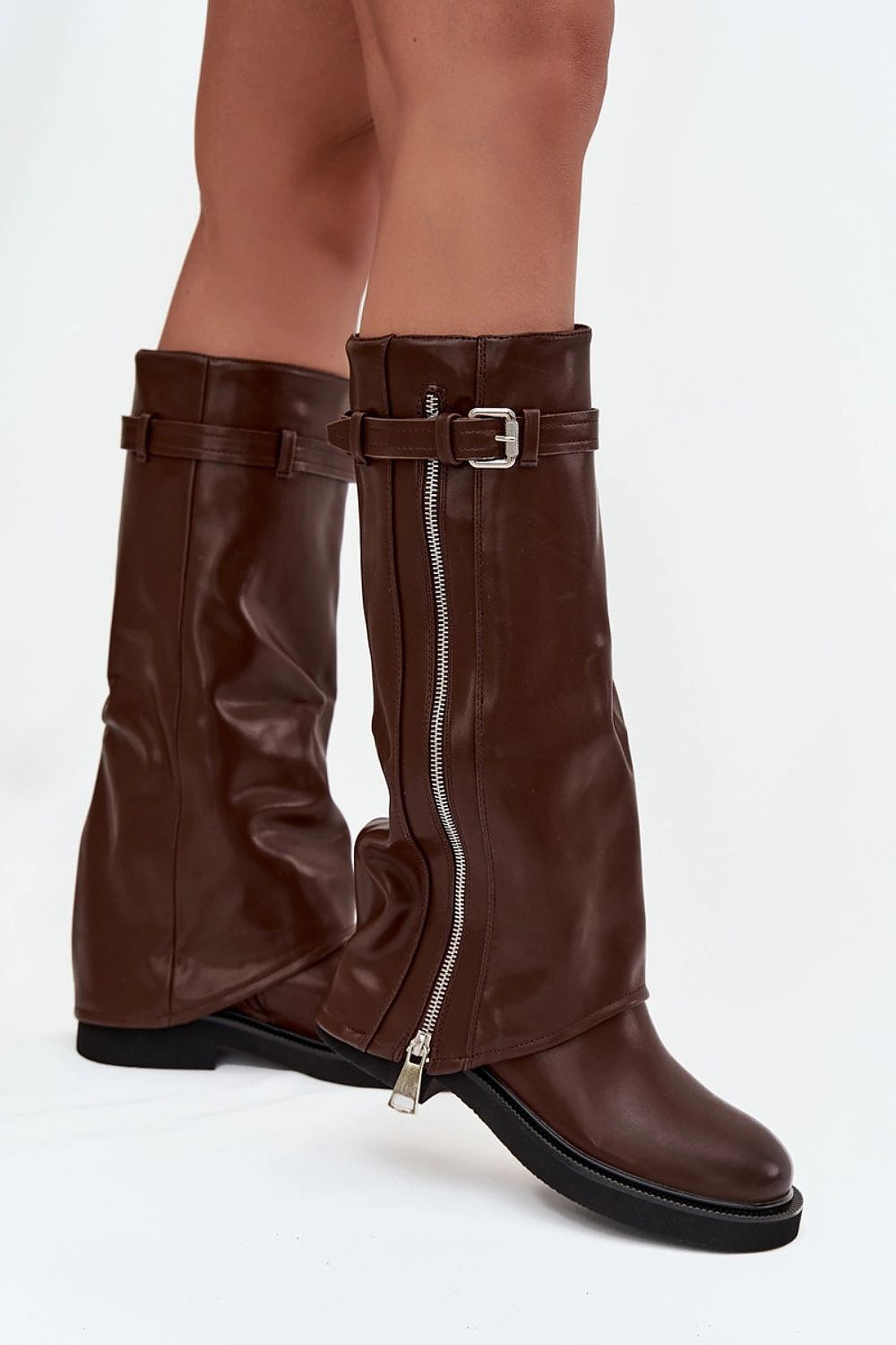 Side view showing folded shaft, flat heel, and decorative zipper accent.