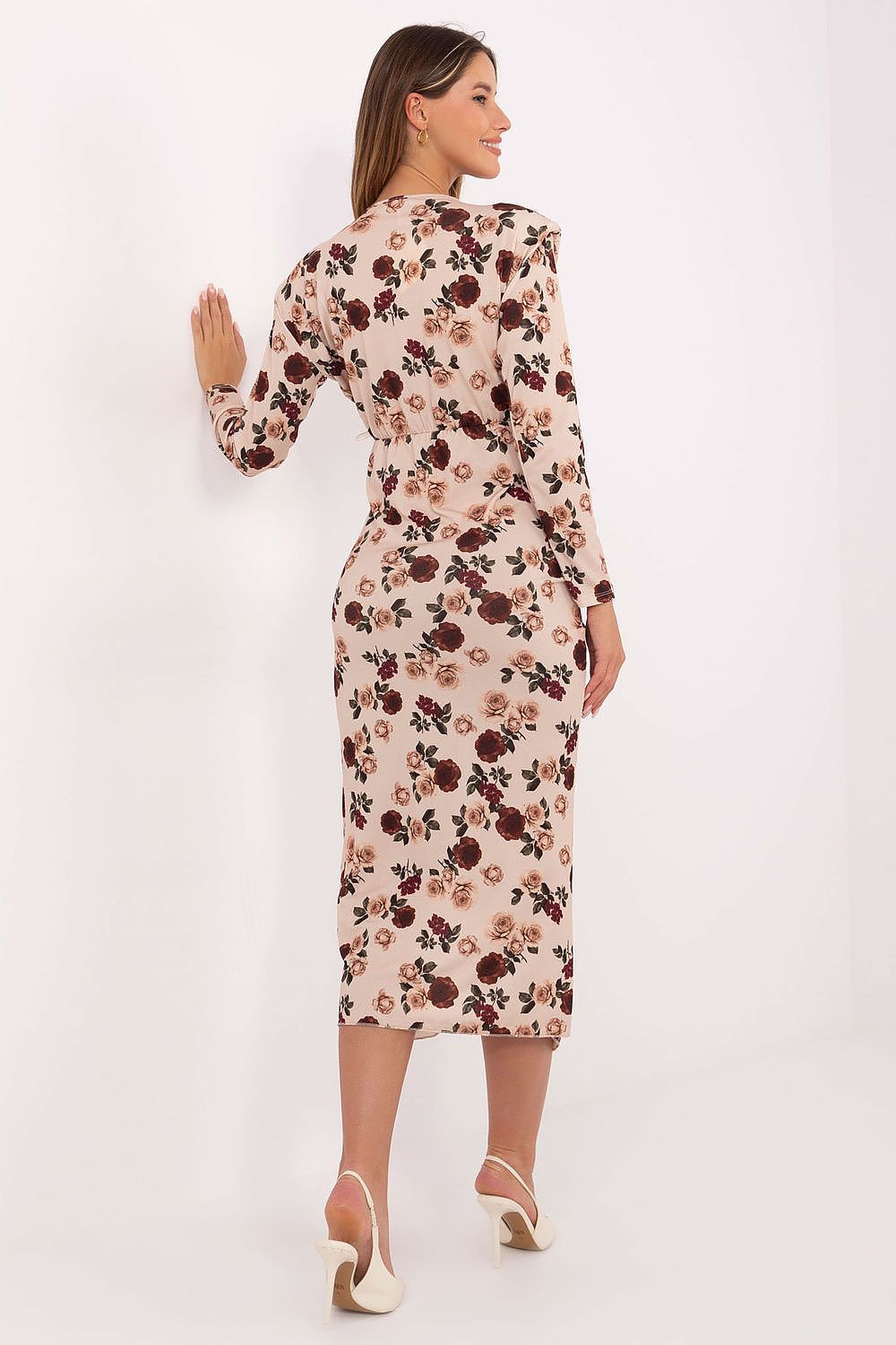 Back view of women’s floral pencil dress highlighting smooth silhouette and midi length