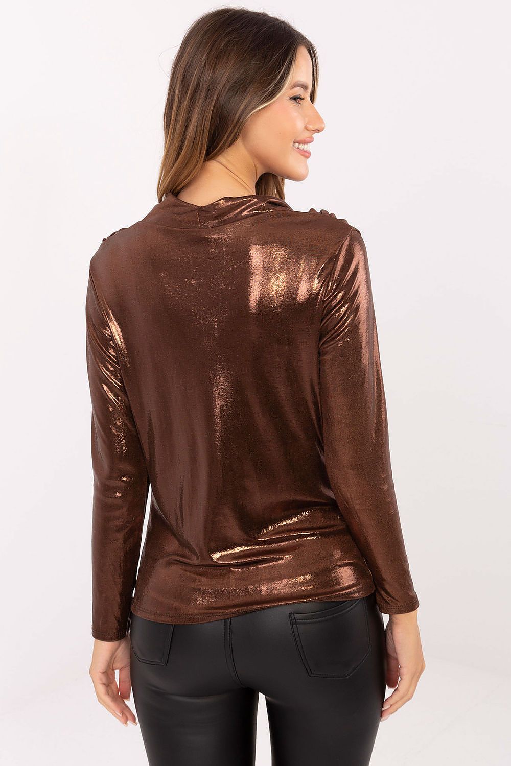 Back view of elegant pleated blouse highlighting the fabric’s subtle sheen in brown