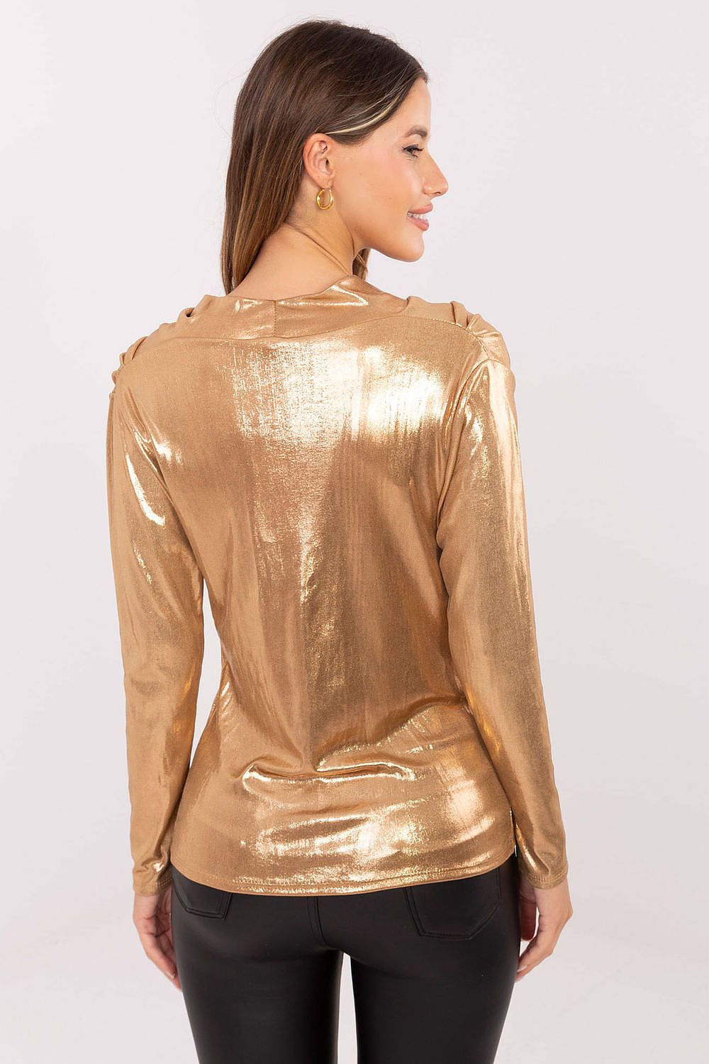 Back view of elegant pleated blouse highlighting the fabric’s subtle sheen.