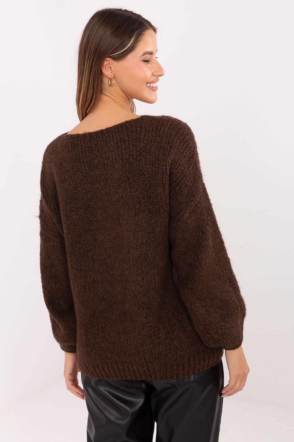 Side view of elegant everyday sweater showing smooth knit texture.