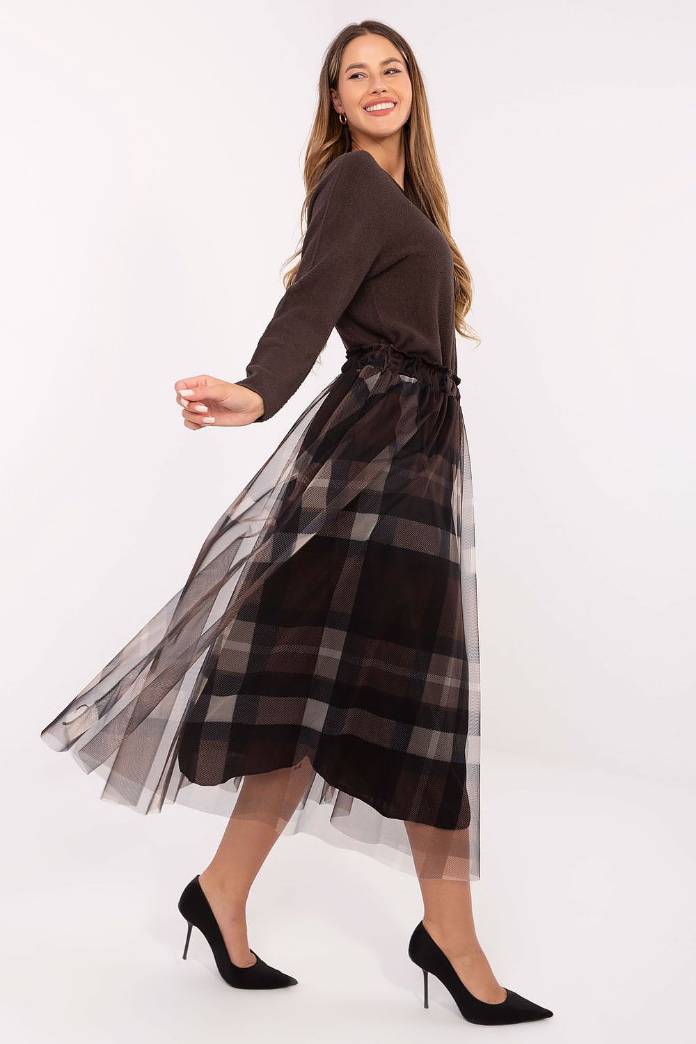 Side view of tulle skirt showing layered fabric and flowy movement.