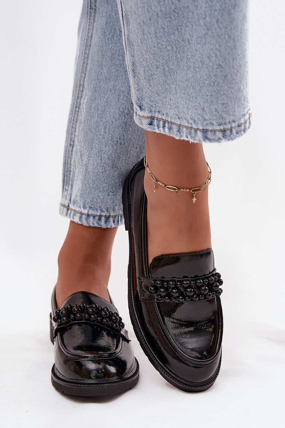 S. Barski patent loafers with decorative beads on the front strap.