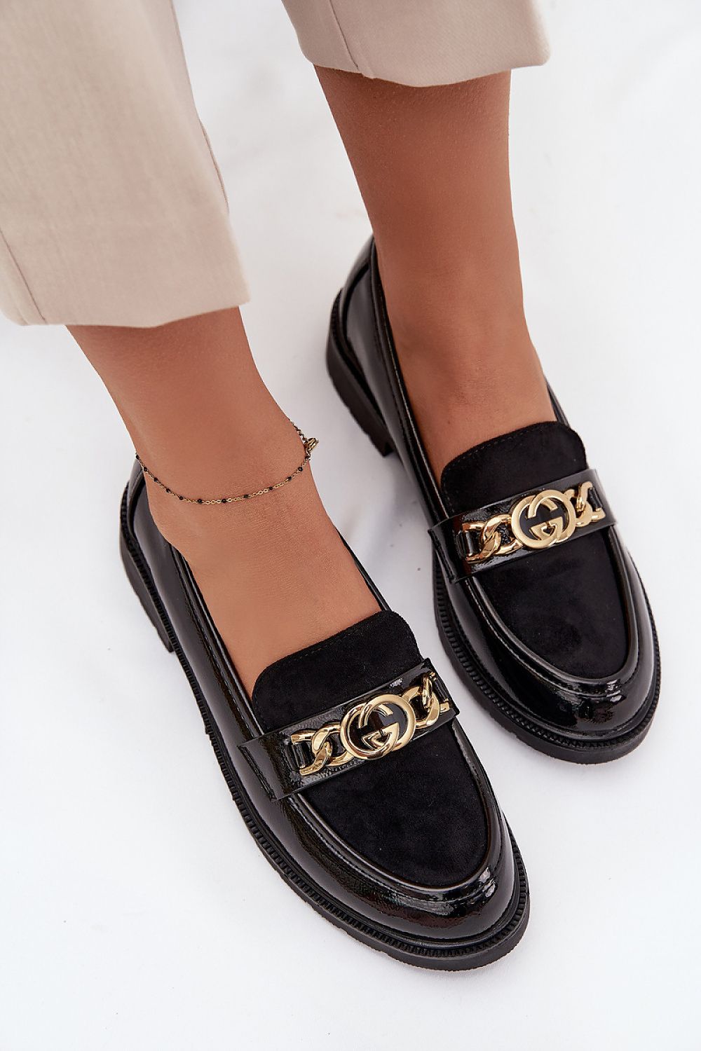 Close-up of soft leather insole and decorative strap on S. Barski loafers.