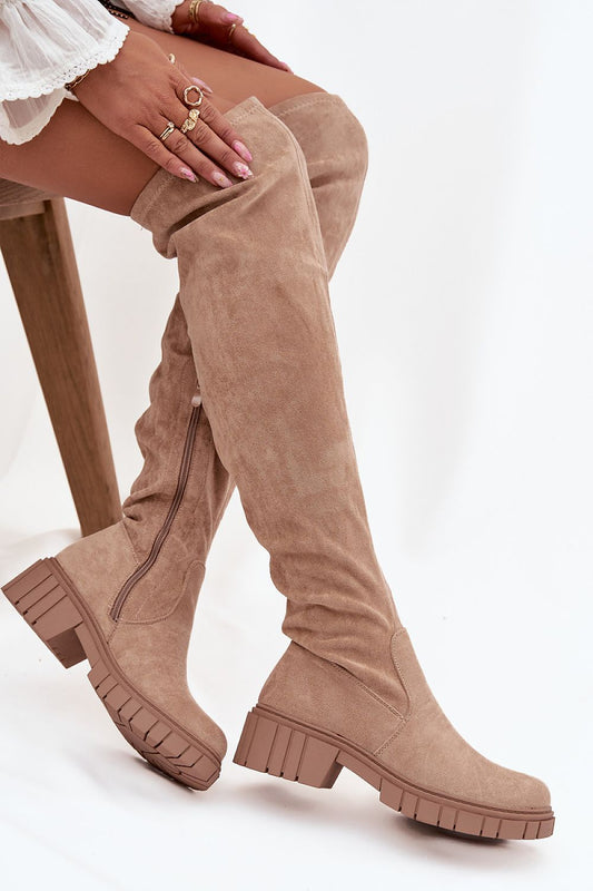 Side view highlighting the zipper detail and smooth eco suede texture.