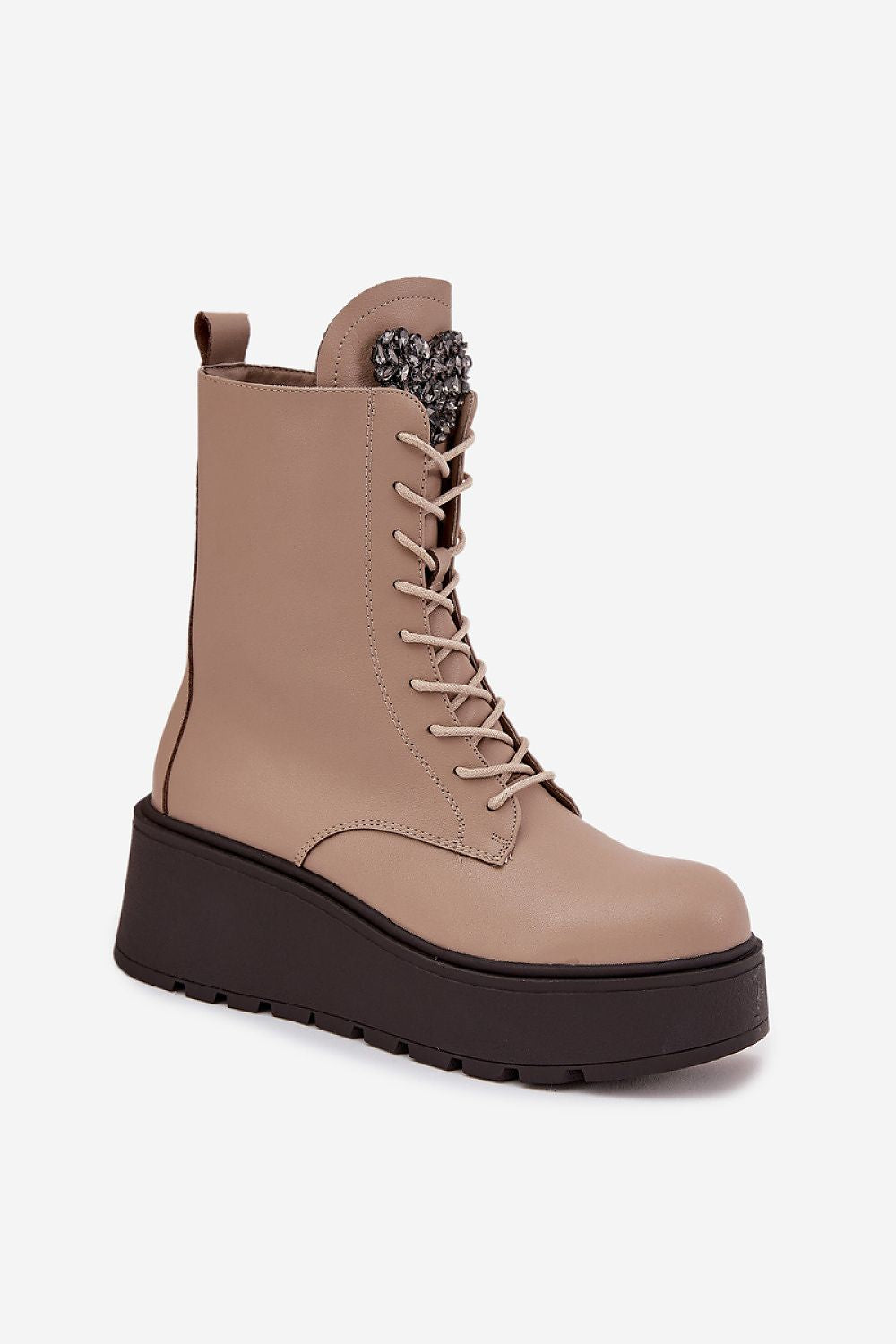 Back view highlighting the elegant silhouette and platform design of the leather ankle boots.