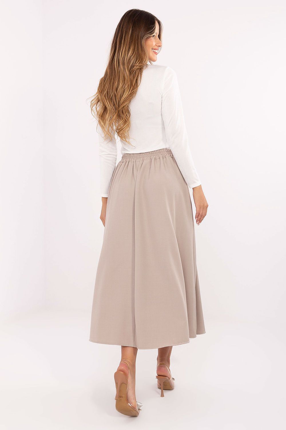 Classic pleated midi skirt showcasing smooth texture and decorative button – back view in beige