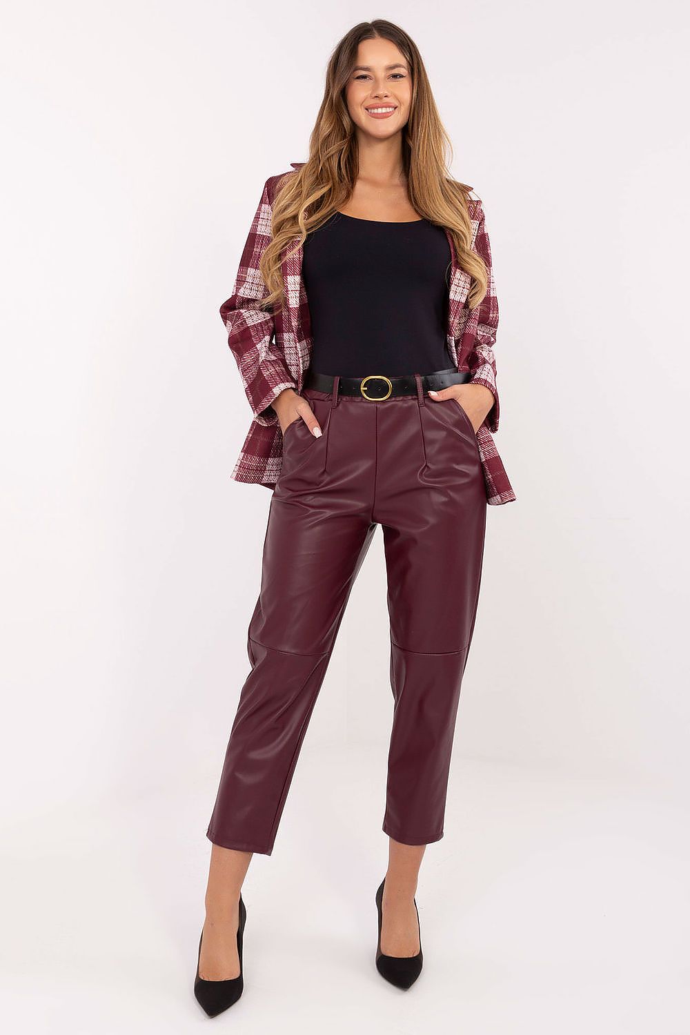 Red leatherette pants with adjustable belt and high waist – front view.