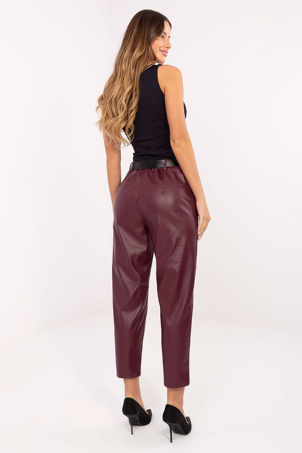 Red insulated leatherette pants with elastic back waistband – back view.