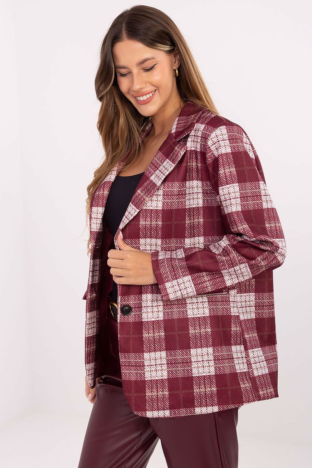 view of the checkered blazer highlighting structured shoulders and fitted silhouette in red