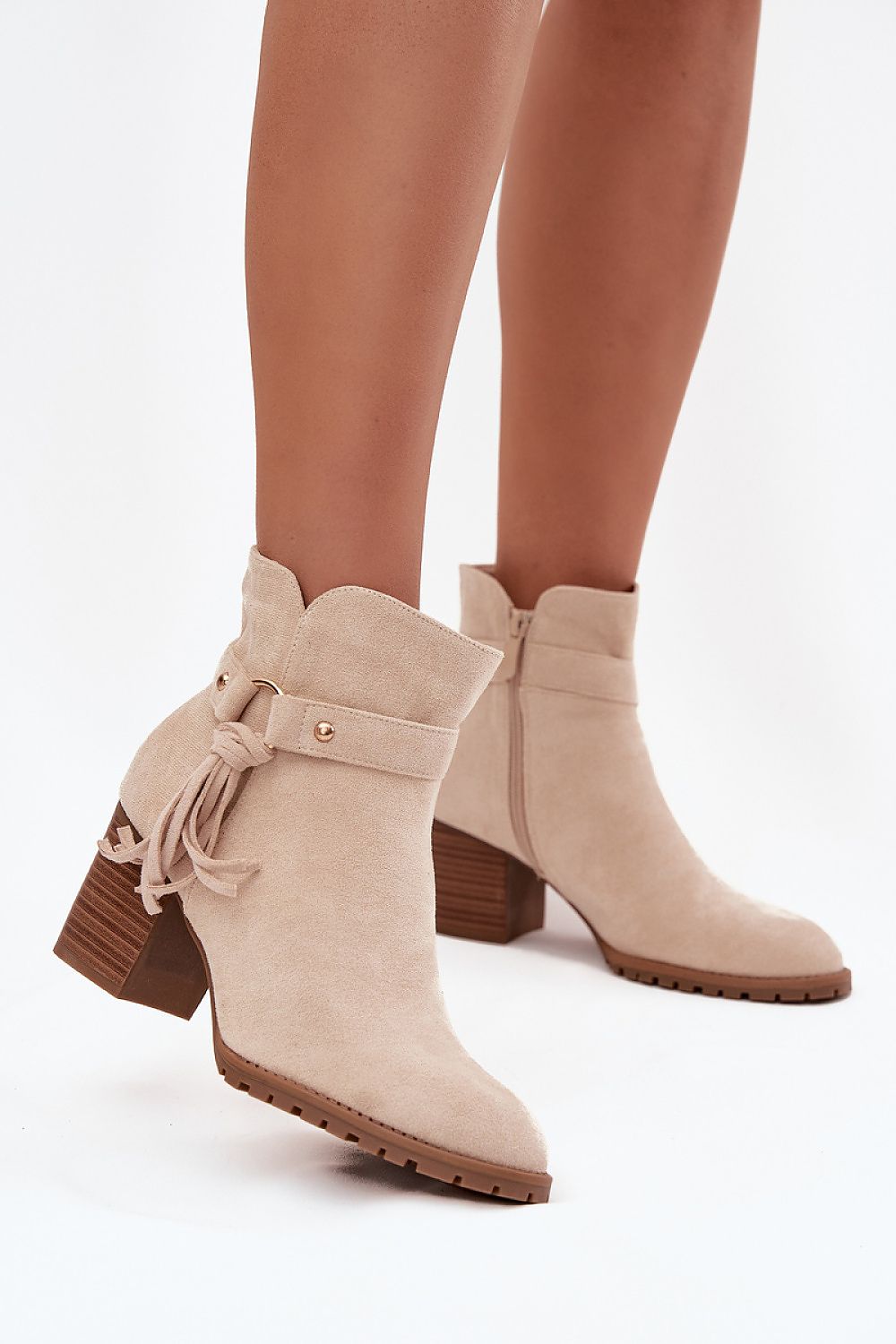 Beige eco-suede ankle boots with fringe strap and column heel