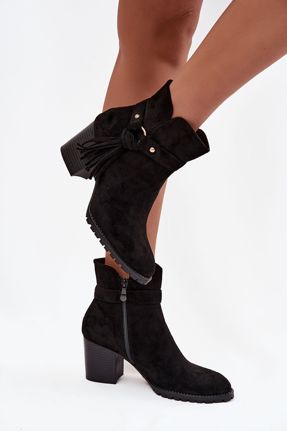 Side view of black eco-suede ankle boots with zipper closure
