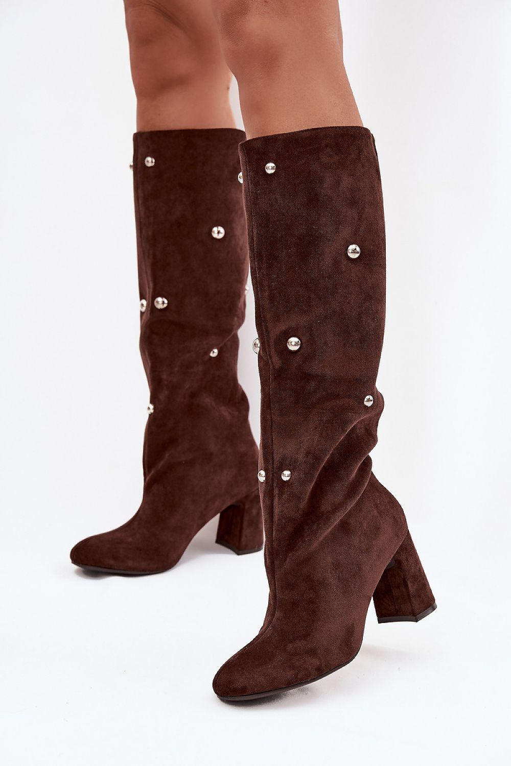  Elegant faux suede heeled boots — close-up of soft texture and classic rounded toe.