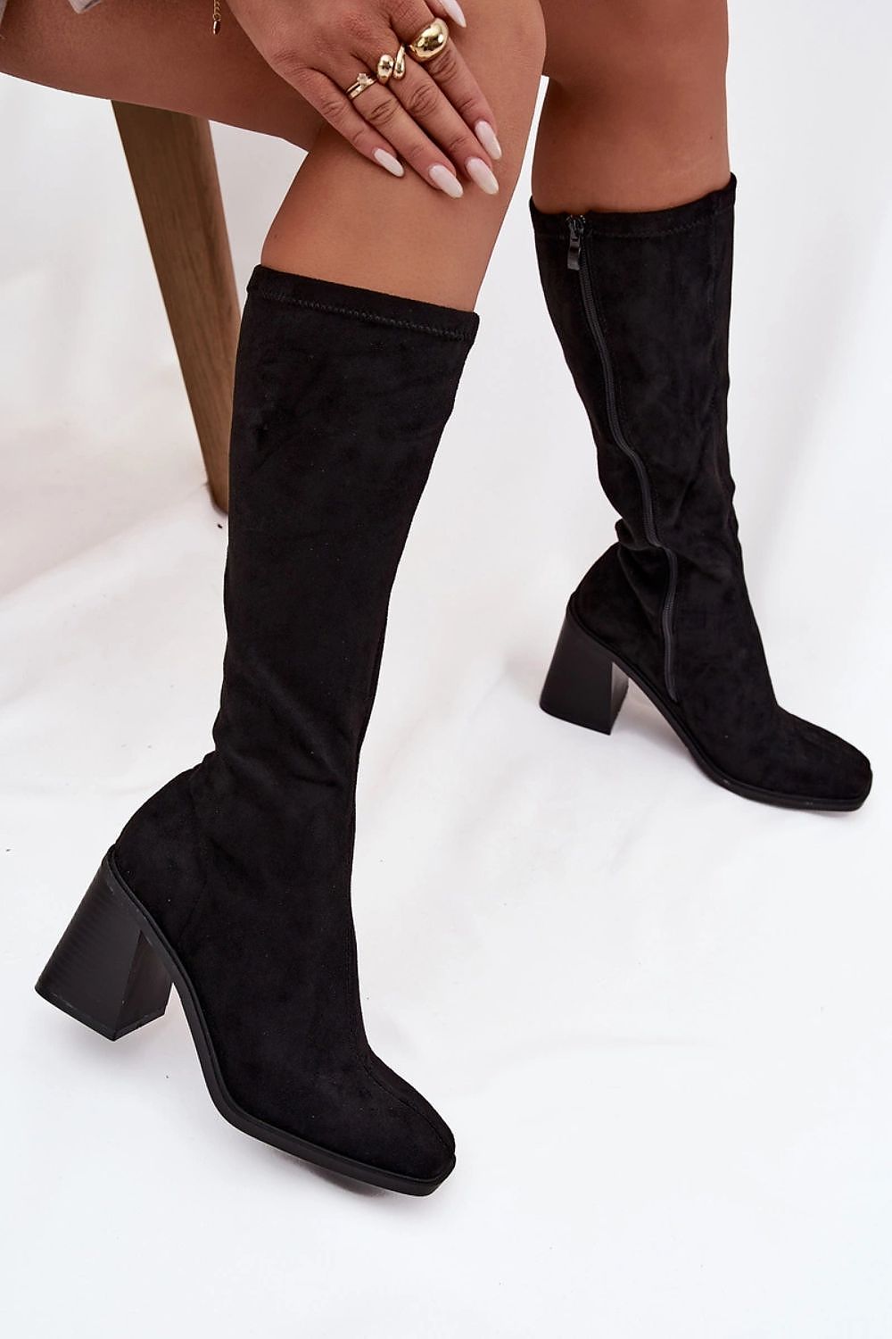 Side view of eco suede column heel boots showing the elegant silhouette and smooth suede texture