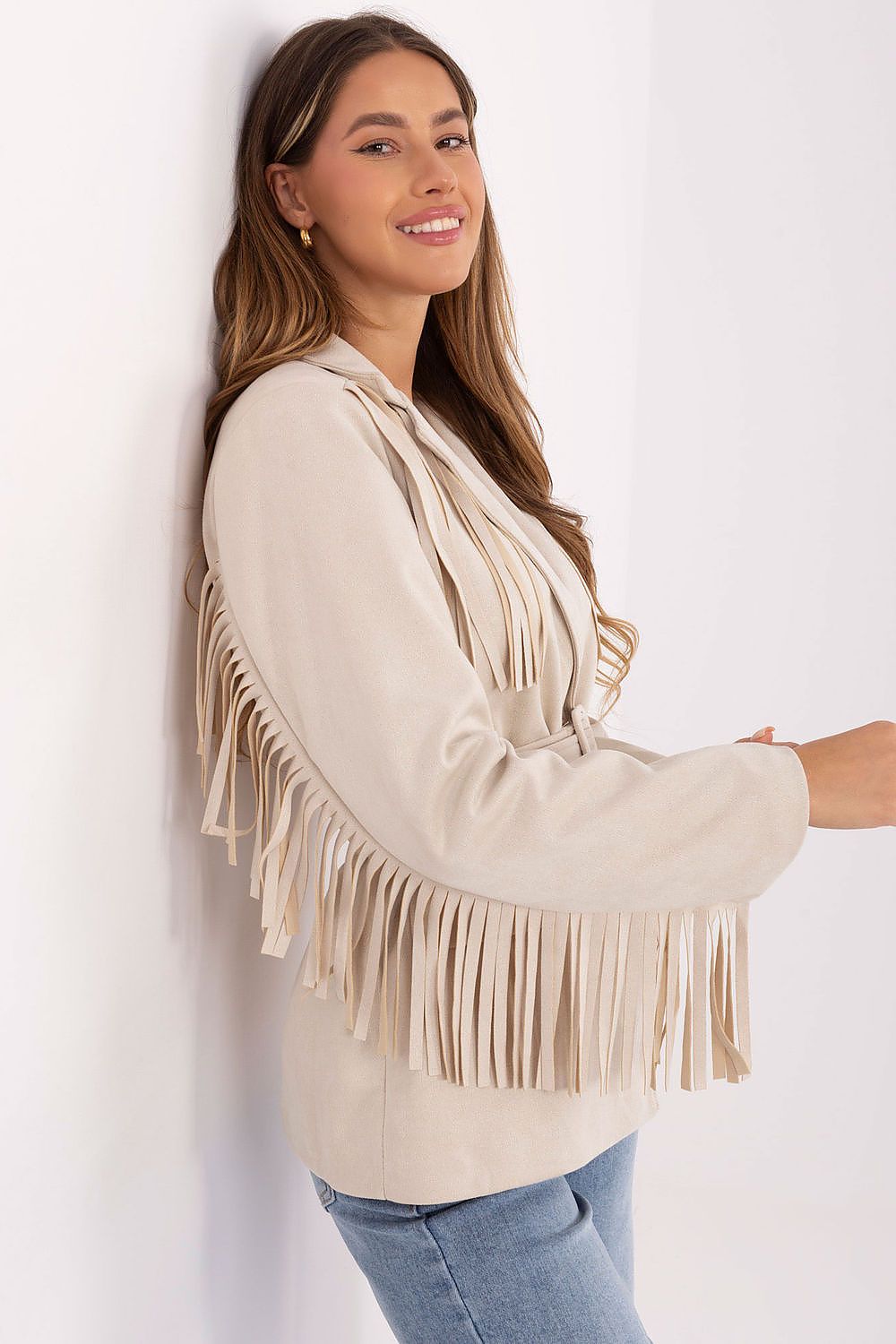  Side view highlighting the soft suede texture and fringed sleeve details.