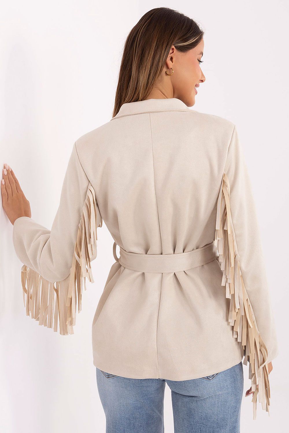  Back view displaying the structured fit and boho-inspired fringes.