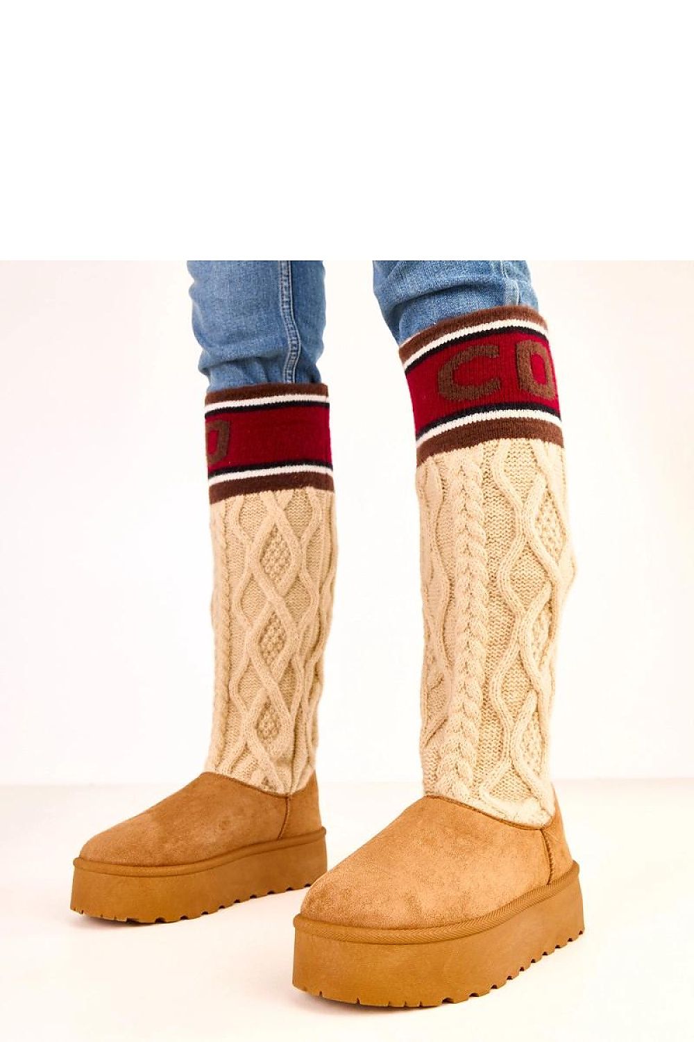 Beige platform boots with cable knit leg warmers on a white background