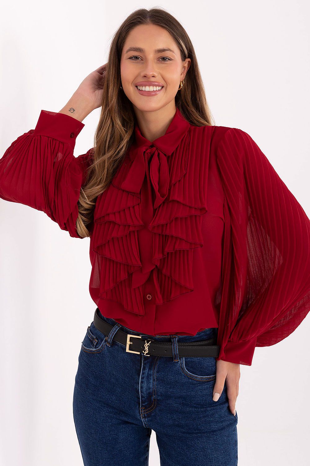 Elegant pleated jabot shirt with tie front and pleated sleeves.