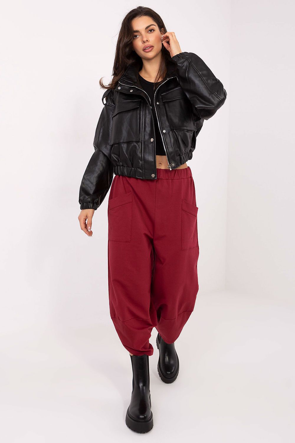  women's sweatpants with leg slits and elastic high waist, front view