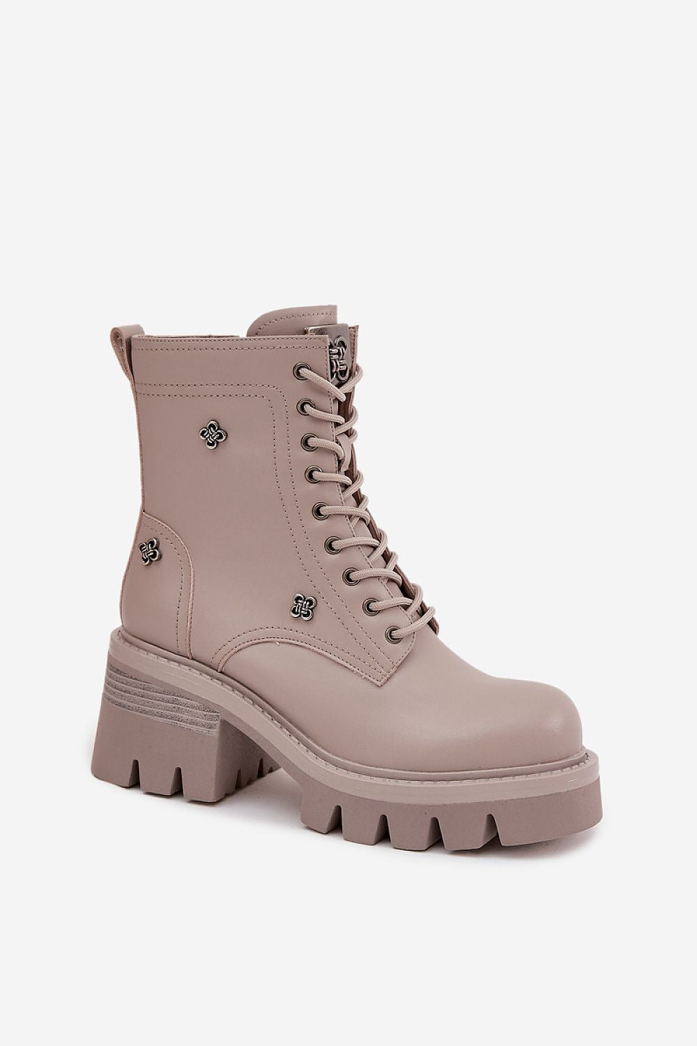 Beige combat boot with chunky sole on a white background