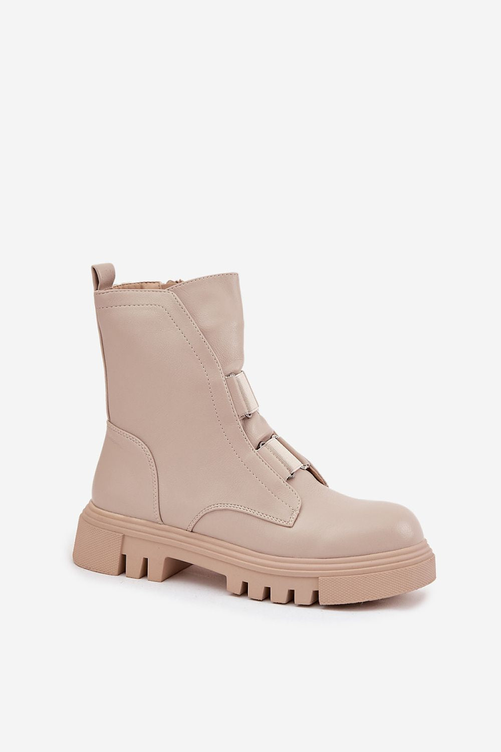 Beige boot with chunky sole on a white background