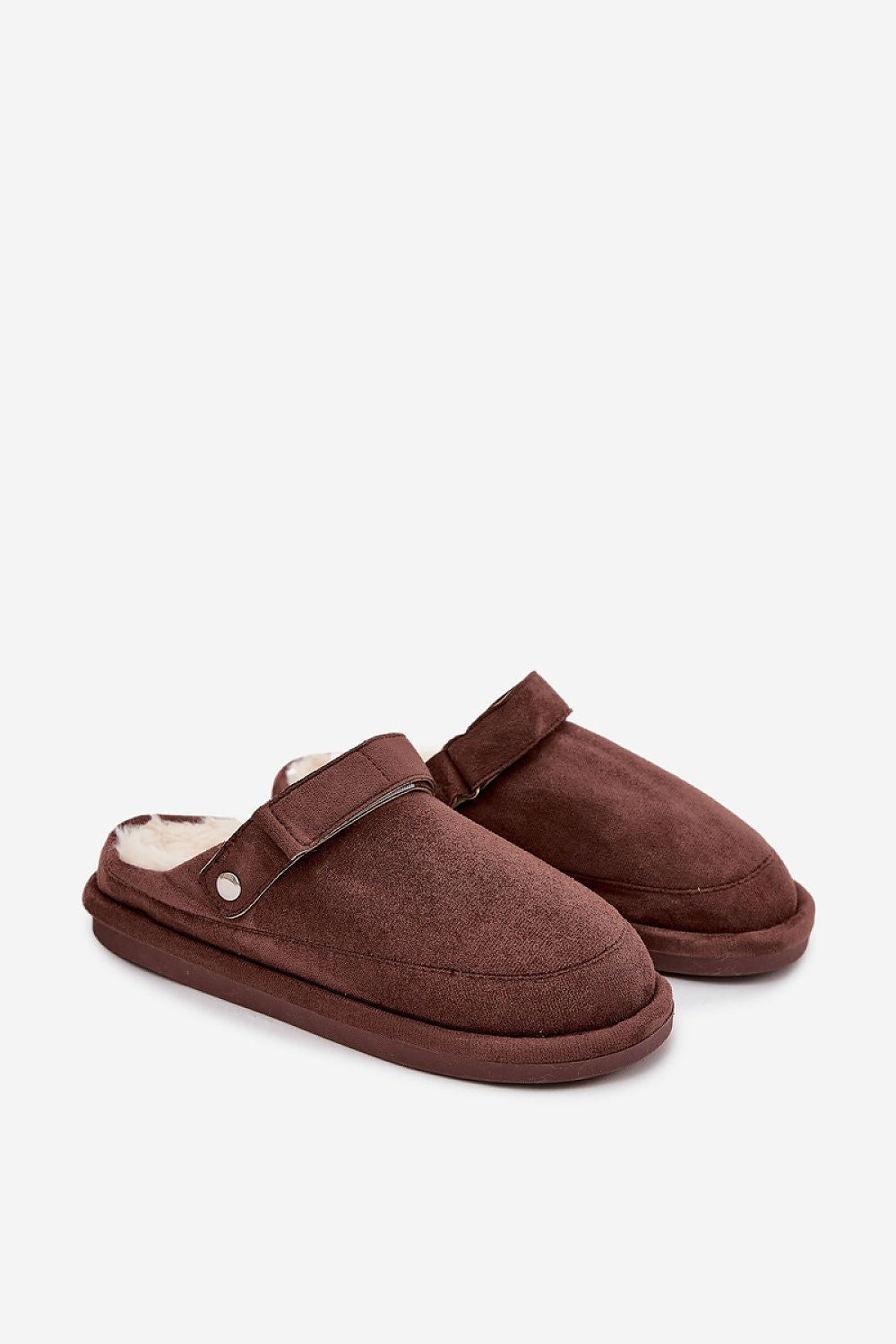 Pair of brown slippers on a white background