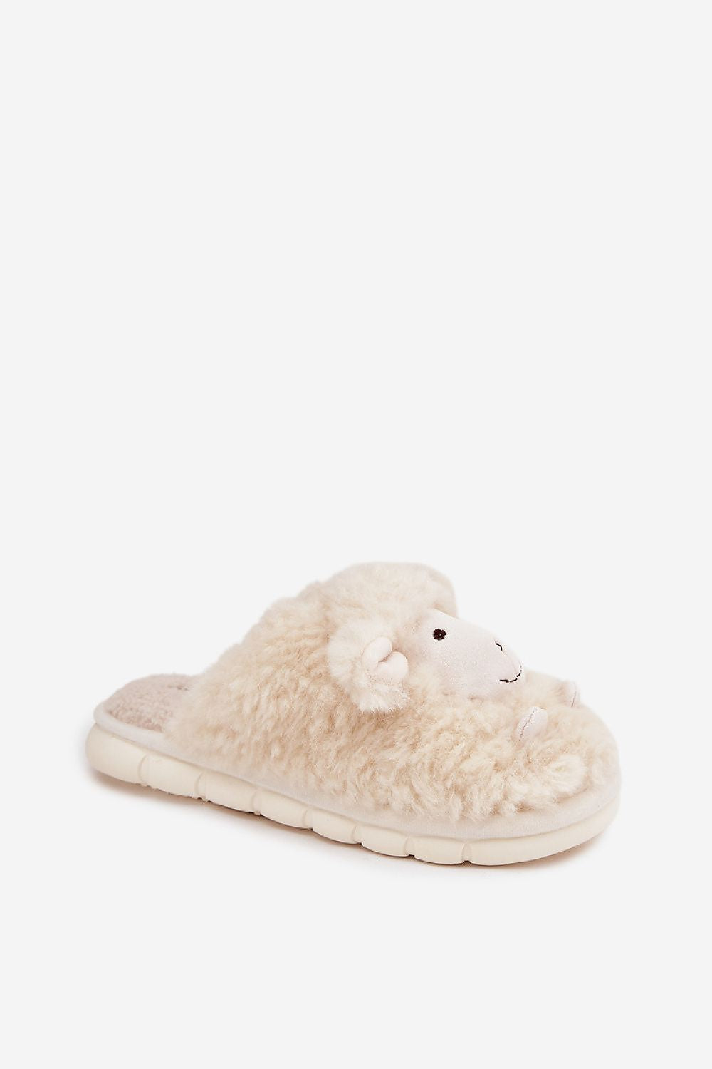 Beige slipper with a sheep design on a white background