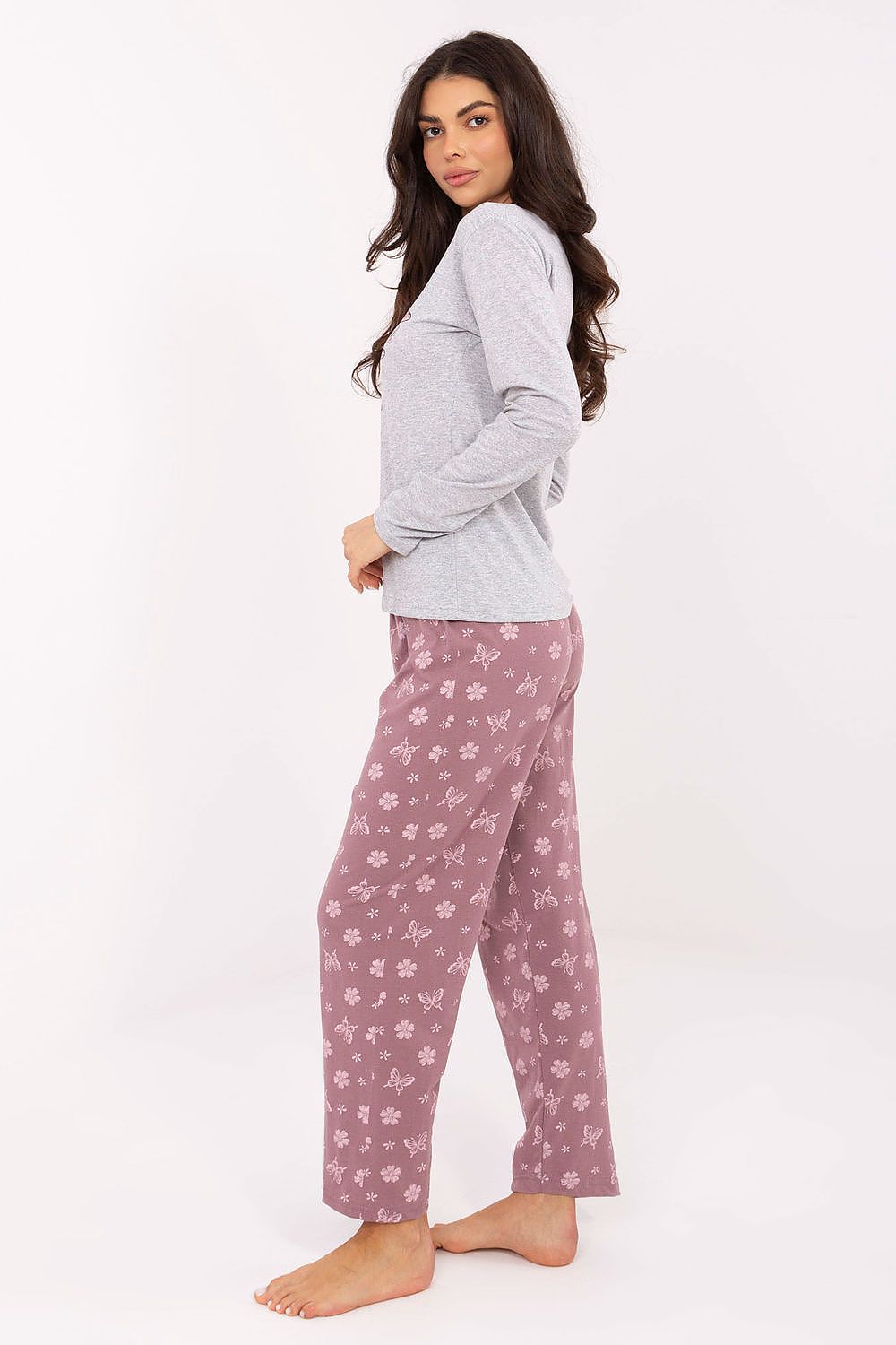  Side angle of grey pyjamas highlighting elastic waistband and delicate butterfly design on top