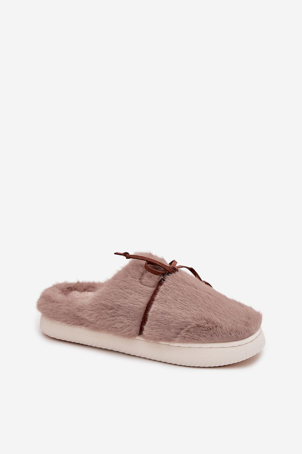 Brown fuzzy slipper on a white background