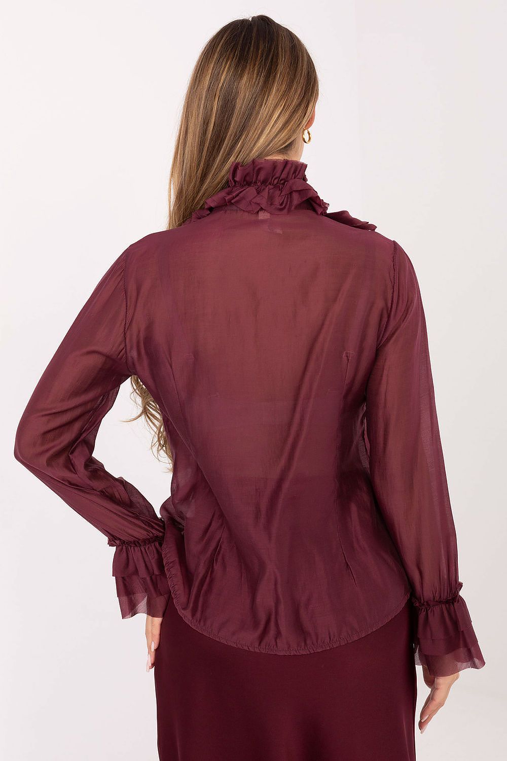 Maroon blouse with ruffled collar and cuffs on a white background