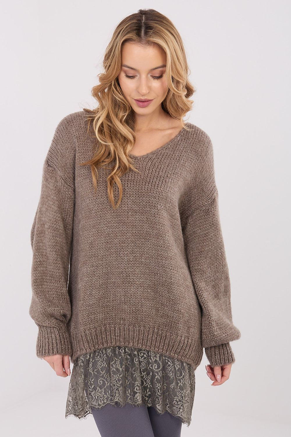  long sweater with lace bottom and puffed sleeves, front view