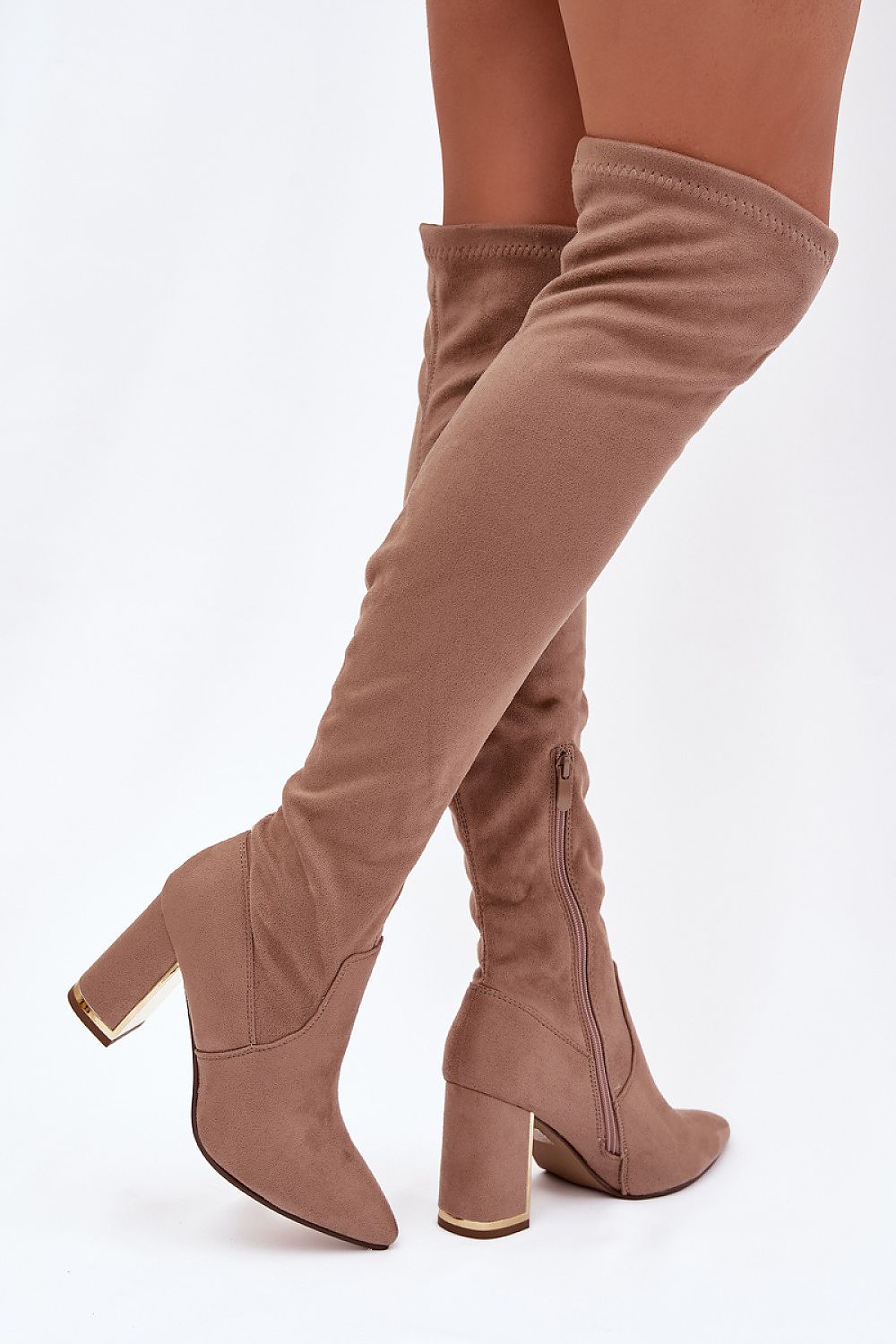 Brown knee-high boots with block heels on a white background