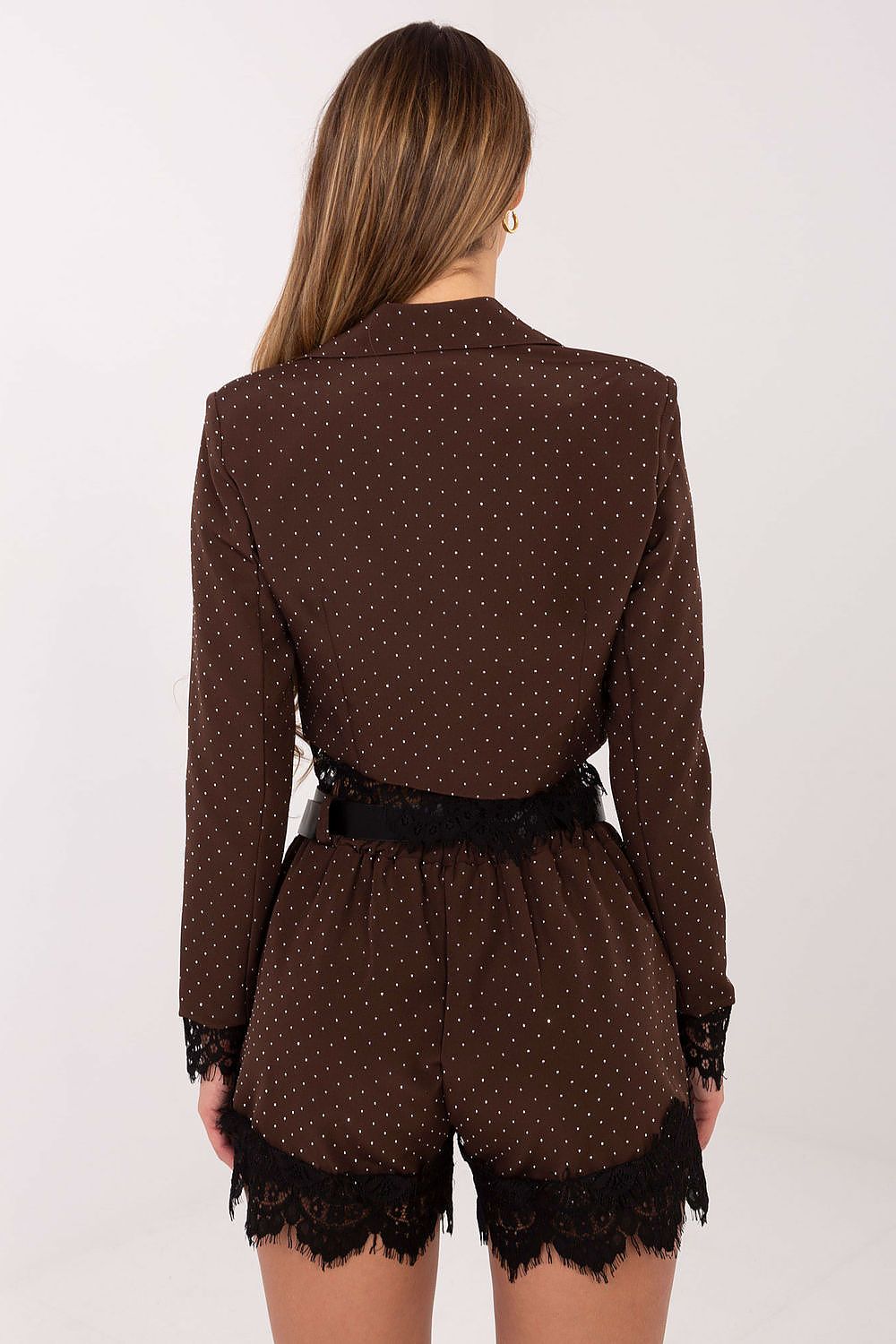Brown polka dot blouse with lace trim on a white background