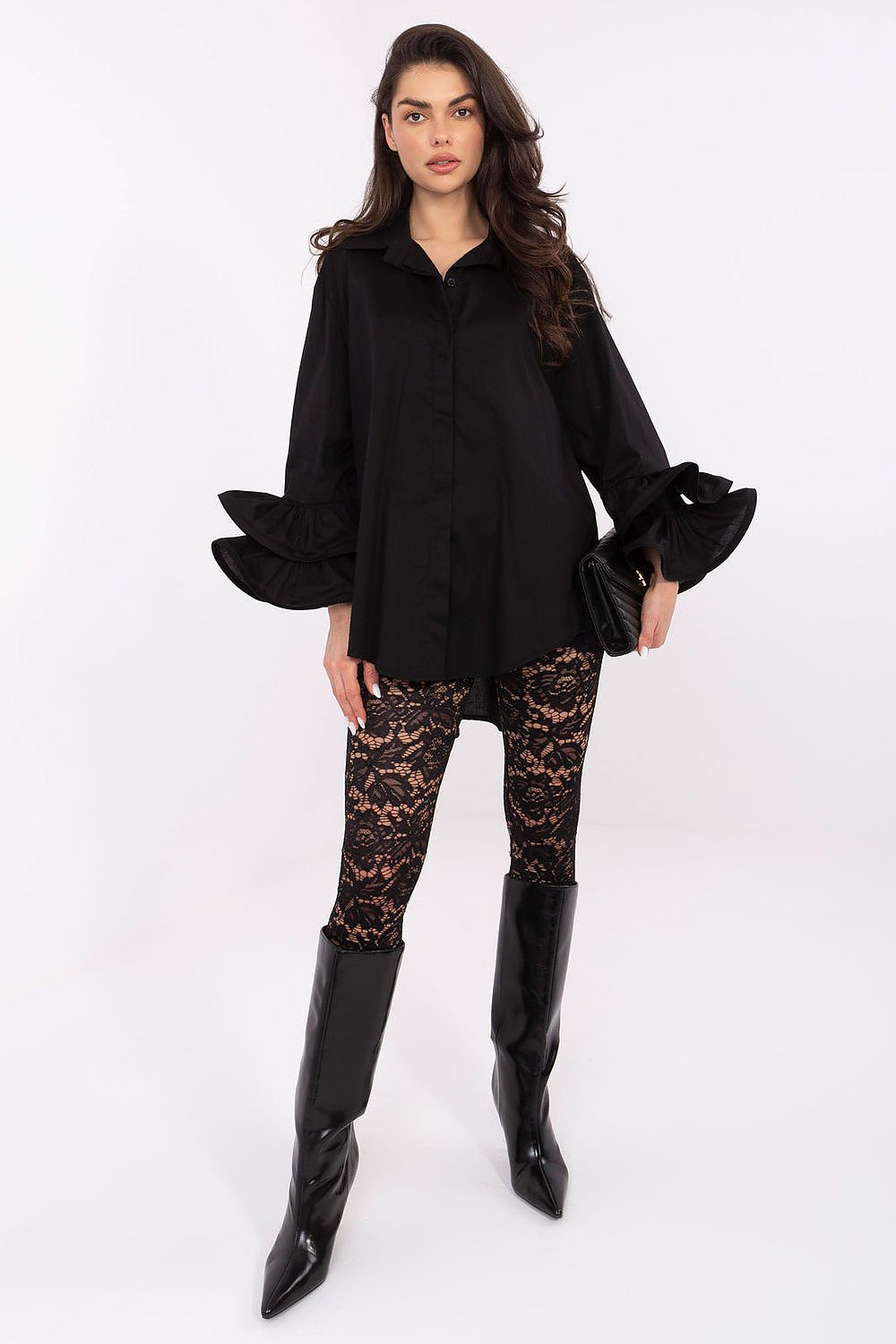  Black women’s elegant shirt with elongated back and ruffled sleeves – front view.