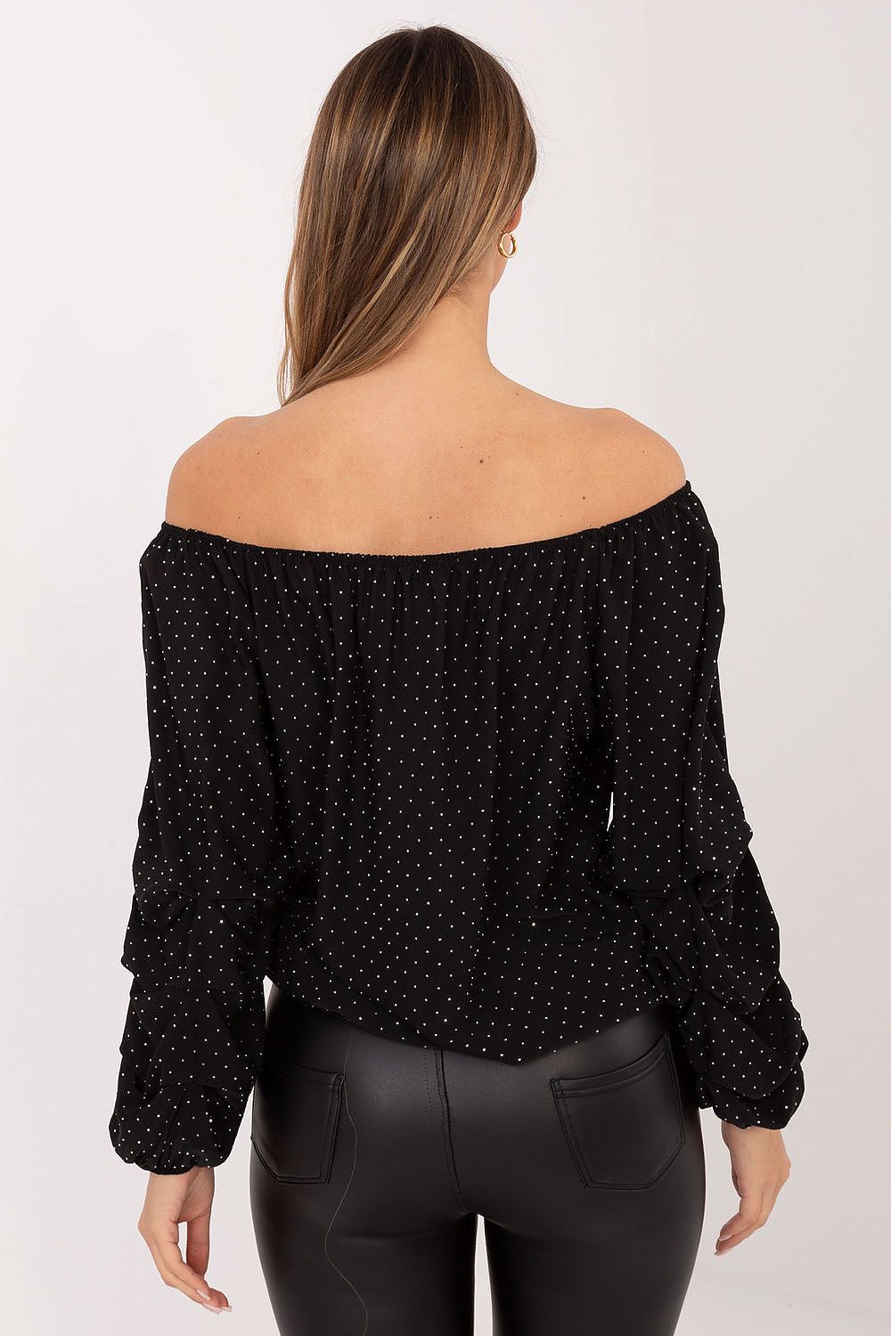  rear view of black off-shoulder blouse showing elegant silhouette