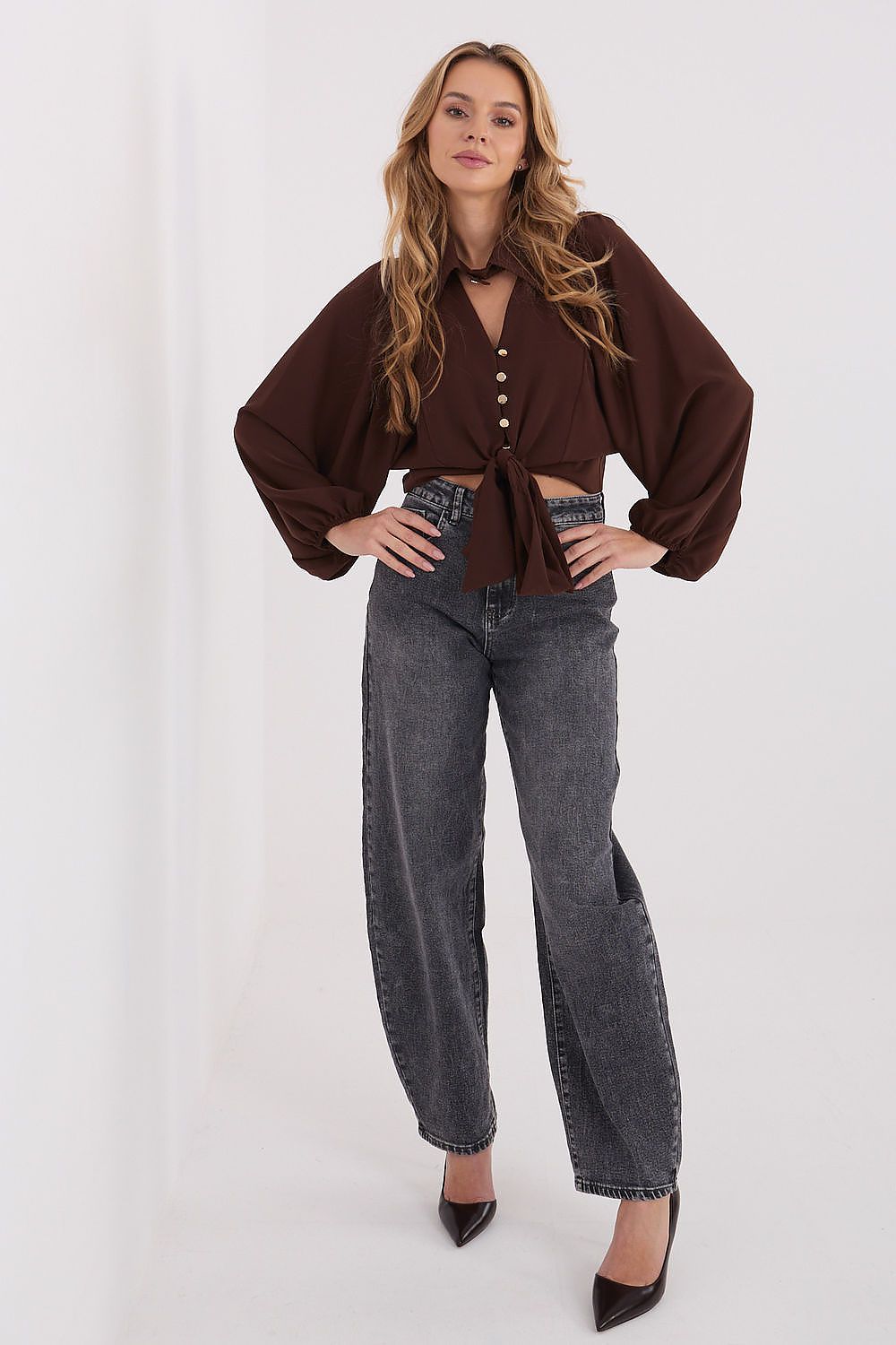 Front view of elegant classic puff-sleeve shirt with tie hem in brown