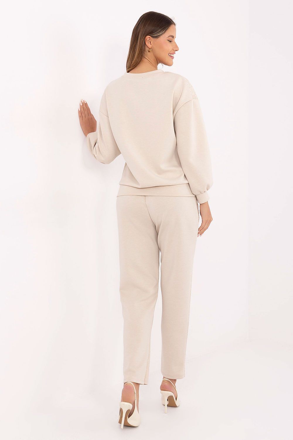 beige soft viscose tracksuit set with tapered pants, rear view