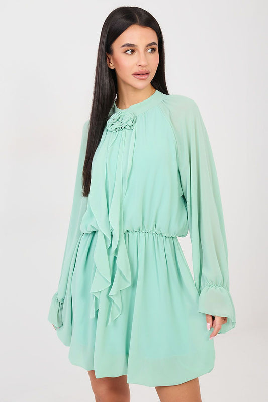  flared cocktail dress with jabot rose and frilled sleeves.